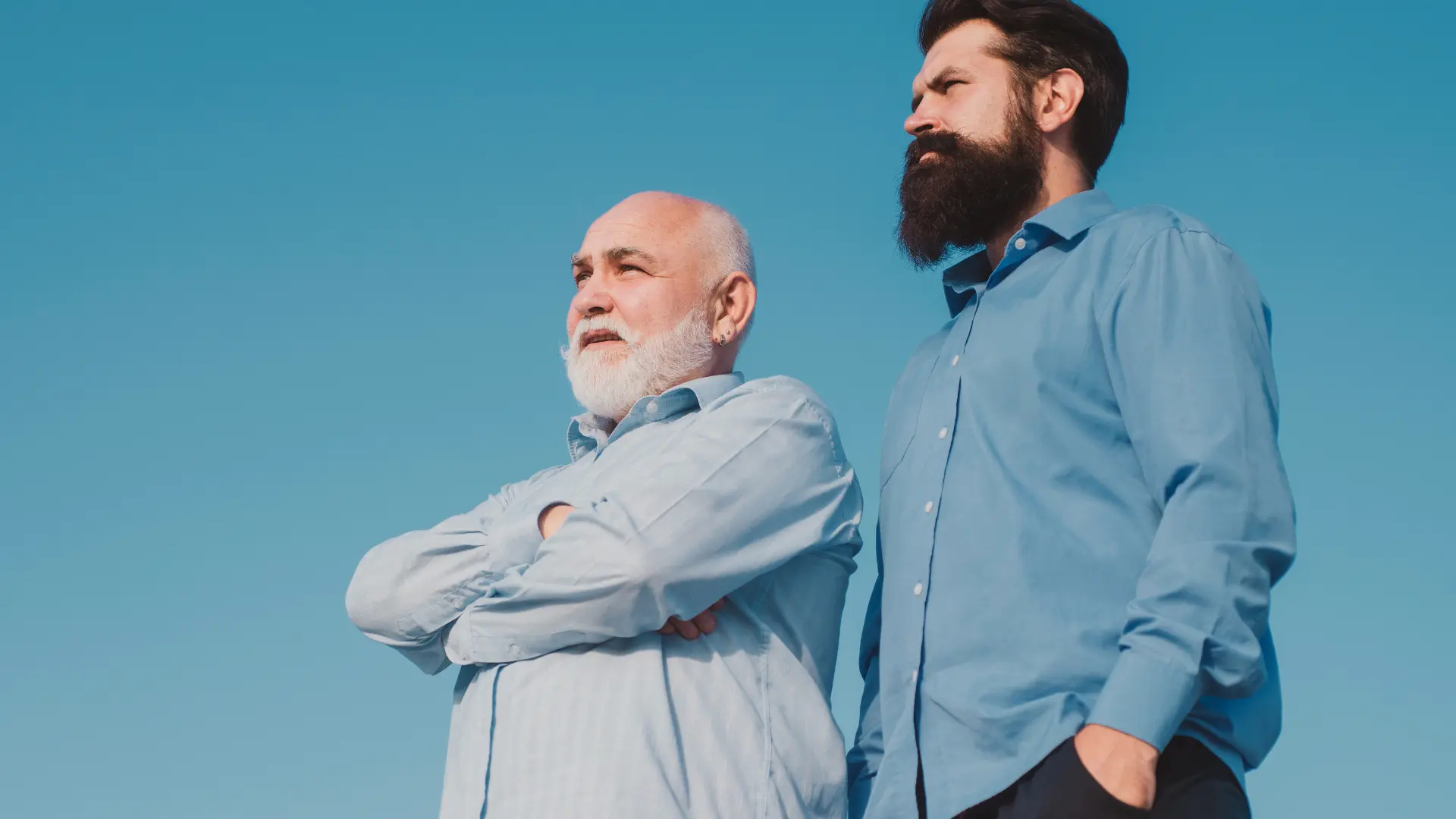 Man standing with another man that is one of his adult children