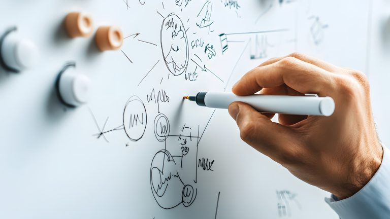 Hand with marker doing flowchart writing