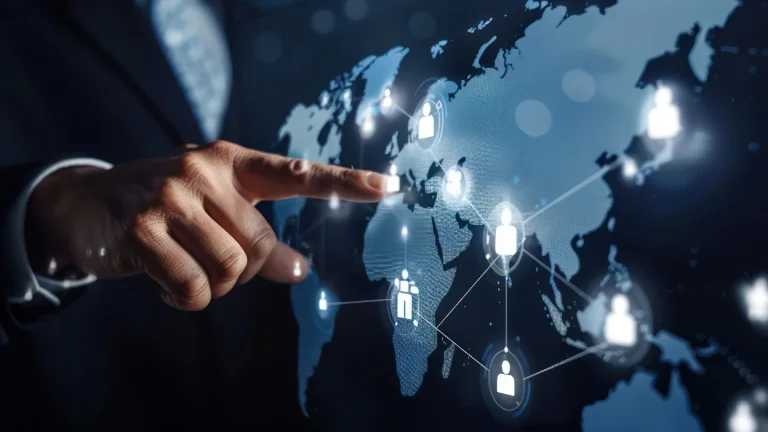 Hand pointing to a map of the world with exit strategy