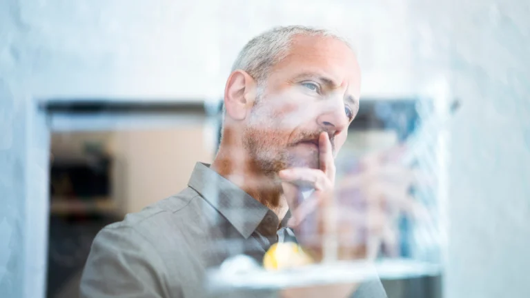 Man assessing some writings about exit strategy