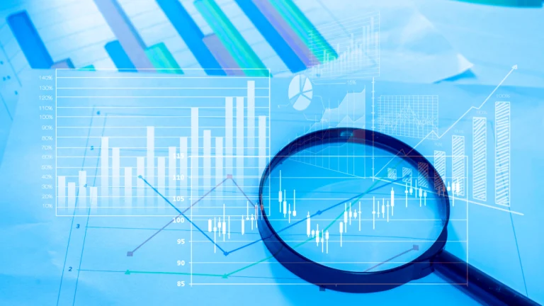 magnifying glass checking on a digital footprint