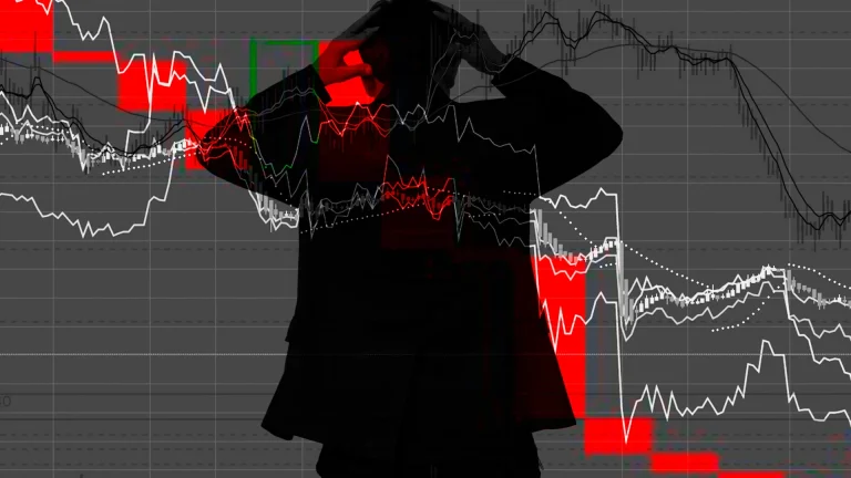 Man standing on a bad business brokers graph status